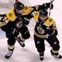 Boston, MA - 3/10/2018 - (3rd period) Boston Bruins right wing Brian Gionta (12) celebrates with Boston Bruins left wing Jake DeBrusk (74) after scoring what turned out to be the game winning goal during the third period. The Boston Bruins host the Chicago Blackhawks in Garden matinee. - (Barry Chin/Globe Staff), Section: Sports, Reporter: Kevin P. Dupont , Topic: 11Blackhawks-Bruins, LOID: 8.4.1196757382.