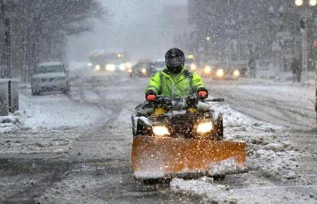 SNOW SLIDER3 BOSTON, MA - 3/13/2018: A good way to get around is have your own personal plow seen here going down Berkley Street Boston during the storm. (David L Ryan/Globe Staff ) SECTION: METRO TOPIC stand alone photo
