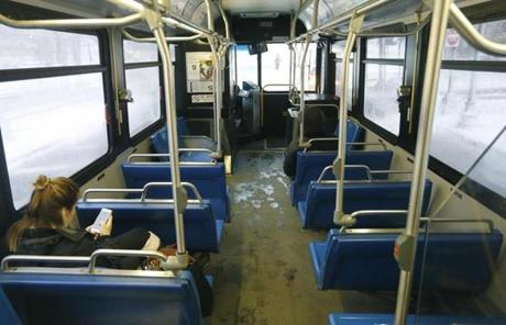 SNOW SLIDER3 Boston, MA- 3/13/2018 - The 93 bus from Sullivan Square was nearly deserted during the commute into Boston on Congress Street. (Bill Greene/Globe staff
