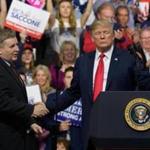 President Trump with Rick Saccone at a campaign rally on Saturday. 