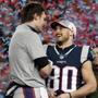 New England Patriots quarterback Tom Brady, left, speaks to wide receiver Danny Amendola after the AFC championship NFL football game against the Jacksonville Jaguars, Sunday, Jan. 21, 2018, in Foxborough, Mass. The Patriots won 24-20. (AP Photo/Winslow Townson)