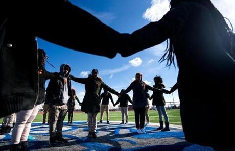WALKOUT SLIDER Mandatory Credit: Photo by JIM LO SCALZO/EPA-EFE/REX/Shutterstock (9458881h) Eastern High School students walk out of class and assemble on their football field for the National School Walkout, a nation-wide protest against gun violence, in Washington, DC, USA, 14 March 2018. Organizers of the 17-minute protest, one minute for each victim of the Stoneman Douglas High School shooting that took place on 14 February, hope to call attention to Congressional inaction on the issue. National School Walkout in Washington, DC, USA - 14 Mar 2018
