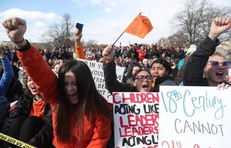 WALKOUT SLIDER Students and gun control advocates march to the Capitol Building in Washington, Wednesday, March 14, 2018. One month after a mass shooting in Florida, students and advocates across the country participate in walkouts and protests to call on Congress for action. (AP Photo/Andrew Harnik)
