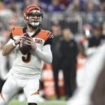 MINNEAPOLIS, MN - DECEMBER 17: AJ McCarron #5 of the Cincinnati Bengals looks to pass the ball in the fourth quarter of the game against the Minnesota Vikings on December 17, 2017 at U.S. Bank Stadium in Minneapolis, Minnesota. (Photo by Hannah Foslien/Getty Images)