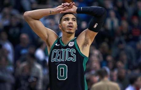 Boston, MA: 3/14/2018: The Celtics JAyson Tatum is pictured reacting after he missed a free throw at the end of the first overtime period that would have won the game for Boston. The Boston Celtics hosted the Washington Wizards in a regular season NBA basketball game at TD Garden. (Jim Davis/Globe Staff)
