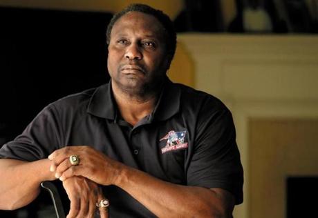 South Easton, MA- March 14, 2018: Ronnie Lippett poses for ap portrait at his home in South Easton, MA on March 14, 2018. The retired New England Patriots cornerback has diagnosed with dementia and has cognitive problems related to playing football but the NFL is denying him benefits under the concussion settlement. (Globe staff photo / Craig F. Walker) section: sports reporter: Hohler
