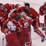 Boston, MA - 3/17/2018 - (3rd period) Boston University Terriers goaltender Jake Oettinger (29) is at the center of the celebration as time ran out on Providence College as BU took a 2-0 win score to win the Hockey East championship at TD Garden. Boston University vs. Providence College in the Hockey East Championship game at TD Garden. - (Barry Chin/Globe Staff), Section: Sports, Reporter: Globe Correspondent, Topic: 18BU-PC Hockey, LOID: 8.4.1303149976.