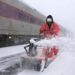 Fred Silva cleared snow from the Rockport commuter rail station platform during Tuesday?s nor?easter. 
