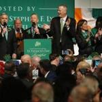 South Boston, MA -- 3/18/2018 - (L-R) Senator Elizabeth Warren sings with Boston City Councilor Michael Flaherty and Congressman Stephen F. Lynch as Governor Baker, Lt. Governor Karyn Polito and Mayor Marty Walsh clap along during the Annual St. Patrick's Day Breakfast at the Ironworkers Local 7 Union Hall. (Jessica Rinaldi/Globe Staff) Topic: 19stpatsbreakfast Reporter: 