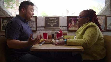 David Chang with University of Maryland professor Psyche Williams-Forson in a booth once used by Martin Luther King Jr. 
