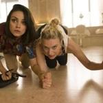 Mila Kunis (left) and Kate McKinnon in a scene from ?The Spy Who Dumped Me.?