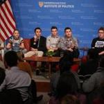 Cambridge, MA - 3/20/2018 - Student panel from Parkland, Forida's Stoneman Douglas High School discuss changing the conversation on guns at Harvard Kennedy School Forum hosted by the Institute of Politics. Panel: L TO R: Meighan Stone, (moderator), Emma Gonzalez, David Hogg, Cameron Kasky, Alex Wind, Matt Deitsch, Ryan Deitsch. #NEVERAGAIN Forum at Harvard Kennedy School. - (Barry Chin/Globe Staff), Section: Metro, Reporter: Globe Staff, Topic: 21Never Again LOID: 