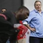 New England Patriots head coach Bill Belichick watches Georgia linebacker Roquan Smith (3) run a drill during Georgia Pro Day, Wednesday, March 21, 2018, in Athens. Pro Day is intended to showcase talent to NFL scouts for the upcoming draft. (Joshua L. Jones/Athens Banner-Herald via AP)