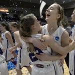 Maeve McNamara and Emma McCarthy of Amherst College celebrated after winning the Division III Women's Basketball Championship in Rochester, Minn., last week.