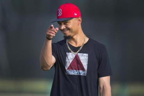 Fort Myers, FL- 2/13/2018 - Red Sox Spring Training- CAPTION. Credit Stan Grossfeld/Boston Globe--- Mookie Betts: ?It's like when you see your best friend walk in and you and your best friend are thinking the same thing. You don?t have to say it, you just look at them and point, that kind of thing. Talking without talking. Exactly. It?s a telepathic communication type thing where you?re both thinking the same thing at the exact same time.?
