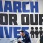 Marjory Stoneman Douglas High School student Cameron Kasky speaks as people gather at the March for Our Lives Rally in Washington, DC on March 24, 2018. Galvanized by a massacre at a Florida high school, hundreds of thousands of Americans are expected to take to the streets in cities across the United States on Saturday in the biggest protest for gun control in a generation. / AFP PHOTO / JIM WATSONJIM WATSON/AFP/Getty Images