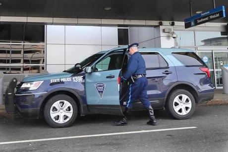 East Boston- 03/23/18- A Massachusetts State Police, Trooper gets into a Troop F SUV in front of Terminal A at Logan Airport. Photo by John Tlumacki/Globe Staff(metro
