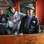Kim Jackson (left) greeted Arthur ?Sonny? Walker, 92, who opened the bar that now bears his name nearly 50 years ago.
