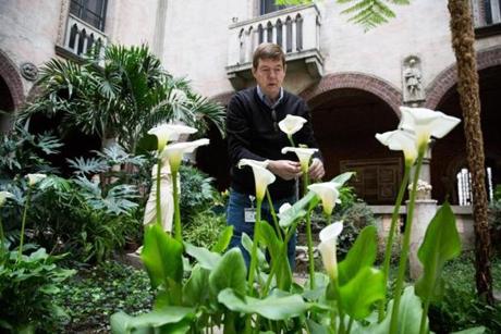 Stan Kozak, chief horticulturist at Boston?s Isabella Stewart Gardner Museum, trimmed flowers in the courtyard. 
