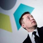 (FILES) In this file photo taken on July 19, 2017 Elon Musk, CEO of SpaceX and Tesla, speaks during the International Space Station Research and Development Conference in Washington, DC. Musk will only get paid if the company's stock soars but would receive a stunning sum if it does, according to a plan approved by shareholders on march 21, 2018. A Tesla spokesperson confirmed that shareholders voted to approve the proposal for a multi-billion-dollar, 10-year performance stock award 