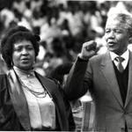 Winnie Mandela stands With Nelson Mandela after his first public appearance in Soweto after his release from prison
