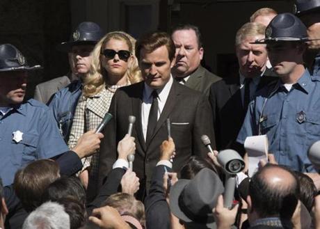 This image released by Entertainment Studios shows Jason Clarke as Ted Kennedy, center, and Andria Blackman stars as Joan Kennedy in a scene from 