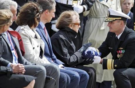 The flag was presented by US Navy Rear Admiral William Galinis to Thomas J. Hudner?s widow, Georgea, during the service.
