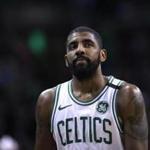 Boston Celtics guard Kyrie Irving (11) heads to the bench during the first quarter of an NBA basketball game in Boston, Wednesday, Feb. 28, 2018. (AP Photo/Charles Krupa)
