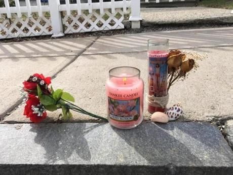 Hyde Park. April 8, 2018. this is the memorial outside 26 Frazer... (no one answered door) ...lot of people not answering doors , but talked to 3 residents who said they are shocked, this was too close to home, one man said he heard five shots in quick succession. he has cameras said police checking footage. John Hilliard/Globe Staff
