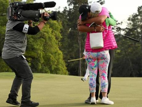 Patrick Reed celebrated with his wife Justine Karain Reed after he won The Masters golf tournament on Sunday.
