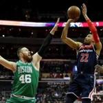 WASHINGTON, DC - APRIL 10: Otto Porter Jr. #22 of the Washington Wizards puts up a shot against Aron Baynes #46 of the Boston Celtics in the first half at Capital One Arena on April 10, 2018 in Washington, DC. NOTE TO USER: User expressly acknowledges and agrees that, by downloading and or using this photograph, User is consenting to the terms and conditions of the Getty Images License Agreement. (Photo by Rob Carr/Getty Images)