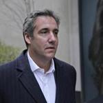 Michael Cohen walks down the sidewalk in New York, Wednesday, April 11, 2018. Cohen, whose offices were raided by federal agents on Monday, has been under intense public scrutiny for weeks over a $130,000 payment to a porn actress who says she had sex with Trump more than a decade ago. (AP Photo/Seth Wenig)
