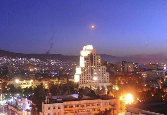 Damascus was rocked by loud explosions Friday night that lit up the sky.