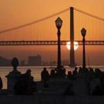 Tour operator Off the Grid asks travelers to not use smartphones on trips. The company will make its first trip to Lisbon in July. People in Lisbon?s Comercio Square watch the sun set behind the April 25th Bridge.