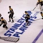 Boston04/12/18 Stanley Cup Playoffs- Bruins vs Maple Leafs- Bruins skate over the playoff emblem in pregame warmups. Photo by John Tlumacki/Globe Staff(sports)