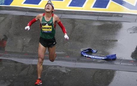 MARATHON SLIDER Boston, MA--4/16/2018-- Yuki Kawauchi reacts after crossing the finish line to win the 122nd Boston Marathon. (Jessica Rinaldi/Globe Staff) Topic: Reporter:

