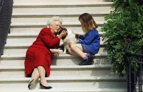 BARBARA SLIDER FILE - In this Sept. 13, 1991, file photo, first lady Barbara Bush, her granddaughter Barbara, and Millie wait on the steps of the White House for U.S. President George H.W. Bush to return from his check-up at Bethesda Naval Hospital in Washington. A family spokesman said Tuesday, April 17, 2018, that former first lady Barbara Bush has died at the age of 92. (AP Photo/Barry Thumma, File )
