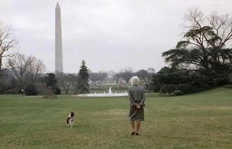 BARBARA SLIDER FILE - In this Feb. 8, 1989, file photo, first lady Barbara Bush strolls on the White House South Lawn in Washington, with the family dog, Millie. A family spokesman said Tuesday, April 17, 2018, that former first lady Barbara Bush has died at the age of 92. (AP Photo/Barry Thumma, File)
