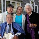Former president George H.W. Bush and former first lady Barbara Bush posed for photos after the wedding of longtime friends Helen Thorgalsen (center) and Bonnie Clement in Kennebunkport, Maine.