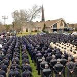 Police from all over the country stood outside the church Wednesday.