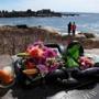 Visitors lay flowers Wednesday at Walker?s Point in Kennebunkport in honor of former first lady Barbara Bush, who died Tuesday.