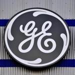 General Electric Co. stuck with its 2018 profit forecast, powering shares to the biggest gain in three years as the beleaguered manufacturer defied expectations of a cut. 