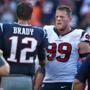 Foxborough, MA: September 24, 2017: Patriots quarterback Tom Brady (left) and Texans DL J.J. Watts (right) shake hands after the game. The New England Patriots hosted the Houston Texans in a regular season NFL football game at Gillette Stadium. (Jim Davis/Globe Staff). 