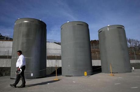 10/22/2015 Plymouth, MA â?? Director of Regulatory & Performance Improvement David Noyes , <cq>, talks about Dry Cask Storage during a tour of the Entergy Pilgrim Nuclear Power Station in Plymouth, MA on October 22, 2015. Each of the 3 casks contains 68 fuel assemblies, they rest on a 4 foot thick pad made of reinforced concrete and steel. Pilgrim Nuclear Power Station started operation in 1972 and will close no later than June 2019. The the US Nuclear Regulatory Commission recently designated Pilgrim one of the nationâ??s three least-safe reactors. ()
