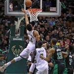 Milwaukee, WI: 4-22-18: The Bucks Giannis Antetokounmpo (34) tips home the game winning basket that gave Milwaukee a 104-102 lead with 5.1 seconds left in the game. The Boston Celtics visited the Milwaukee Bucks for Game Four of their NBA Eastern Conference first round playoff series at the Bradley Center. (Jim Davis/Globe Staff)