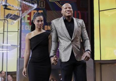 Ryan Shazier, right, walks with his wife Michelle to announce the Pittsburgh Steelers selection in the first round of the NFL football draft, Thursday, April 26, 2018, in Arlington, Texas. (AP Photo/David J. Phillip)
