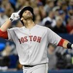 Boston Red Sox's J.D. Martinez reacts after hitting a three-run home run against the Toronto Blue Jays during the fifth inning inning of a baseball game in Toronto on Thursday, April 26, 2018. (Nathan Denette/The Canadian Press via AP)
