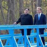 North Korean leader Kim Jong Un (left) and South Korean President Moon Jae-in spoke as they walked over a footbridge at the border village of Panmunjom in the DMZ, South Korea.