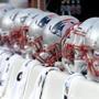 New England Patriots helmets are seen on the bench during the first half of an NFL football game against the Buffalo Bills, Sunday, Dec. 3, 2017, in Orchard Park, N.Y. (AP Photo/Adrian Kraus)