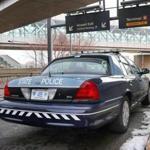 A Massachusetts State Police Troop F vehicle parked at Logan Airport?s Terminal A.